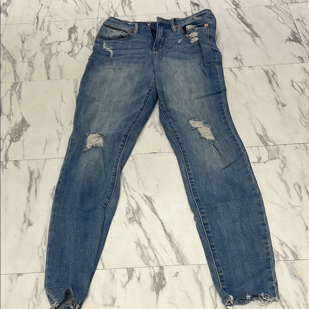 Distressed Blue Jeans